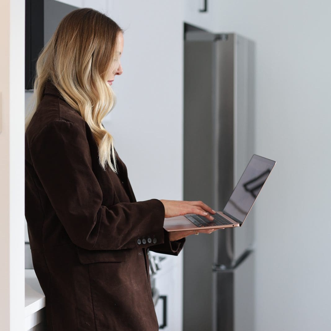 Dr. Heather Iverson reviewing longevity supplement orders through a professional dispensary platform